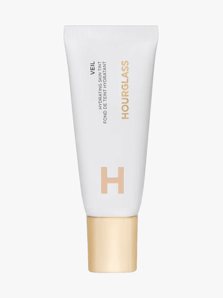 Hourglass Veil Hydrating Skin Tint in branded tube component on a light gray background